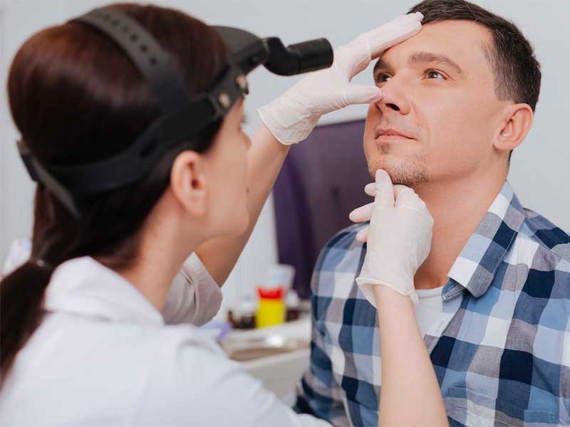 A man considering balloon sinuplasty to relieve chronic sinus infections.